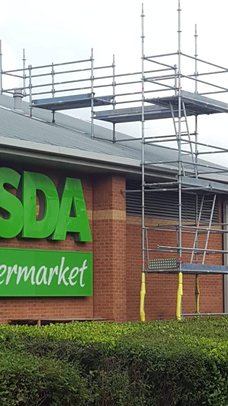 Commercial scaffolding giving access to a roof for repair Commercial scaffolding giving access to a roof for repair